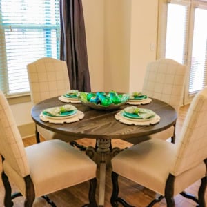Townhomes at Chapel Watch Village townhome dining area with a dining table, chairs, and a dining set