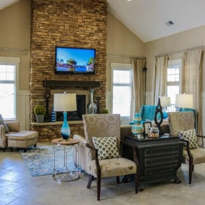Townhomes at Chapel Watch Village community amenities with a resident clubhouse, media center, and lounge area