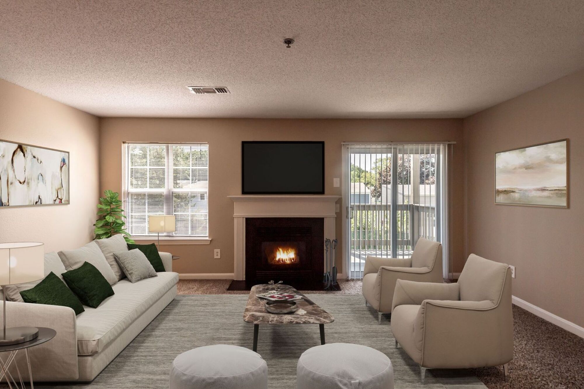 A cozy living room with a sofa, chairs, fireplace, TV, large windows, and a sliding door to a balcony.