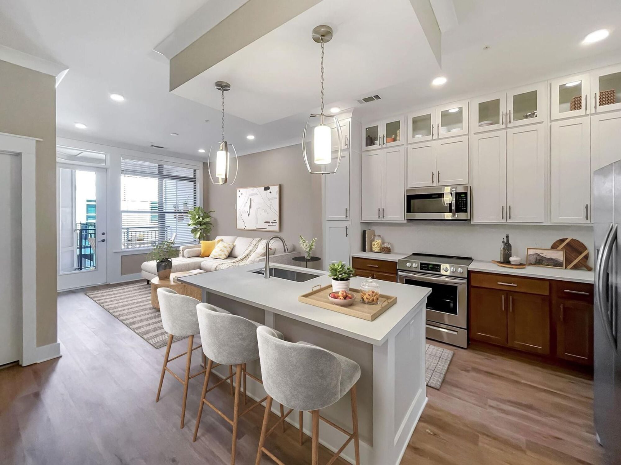 A6 unit kitchen with floating island and floor to ceiling cabinets