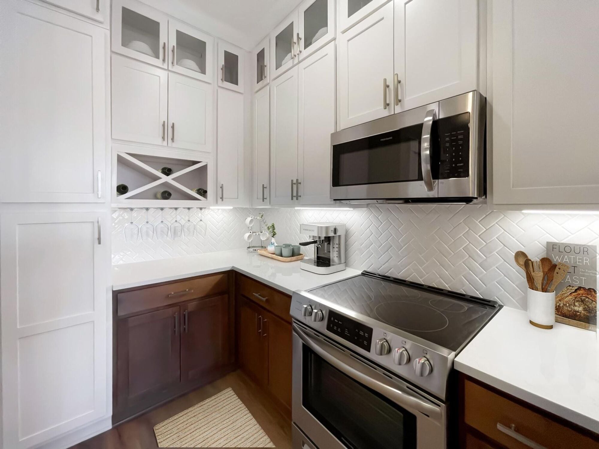 A1 kitchen featuring floor to ceiling cabinets and built-in wine rack