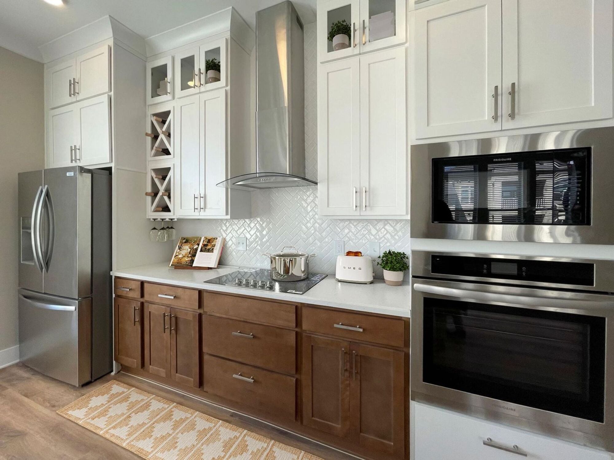 B3-P kitchen with floor to ceiling cabinets and brown white finish