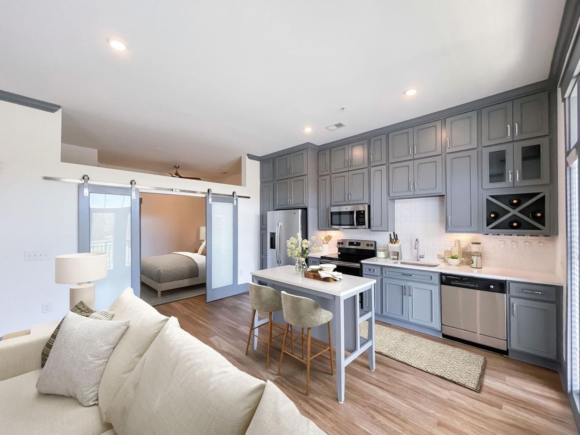 Jax open concept kitchen featuring sliding barn door
