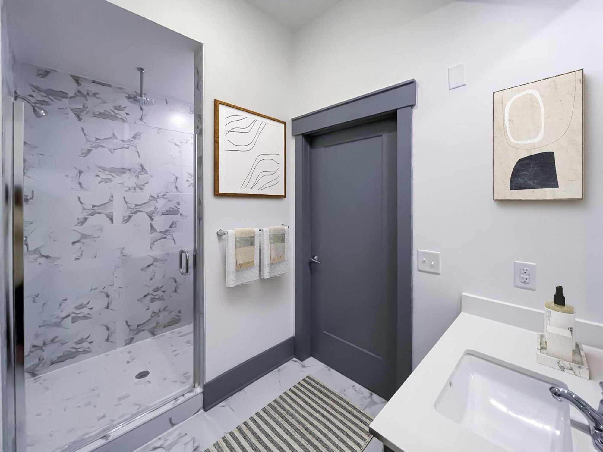Jax bathroom featuring large walk in shower