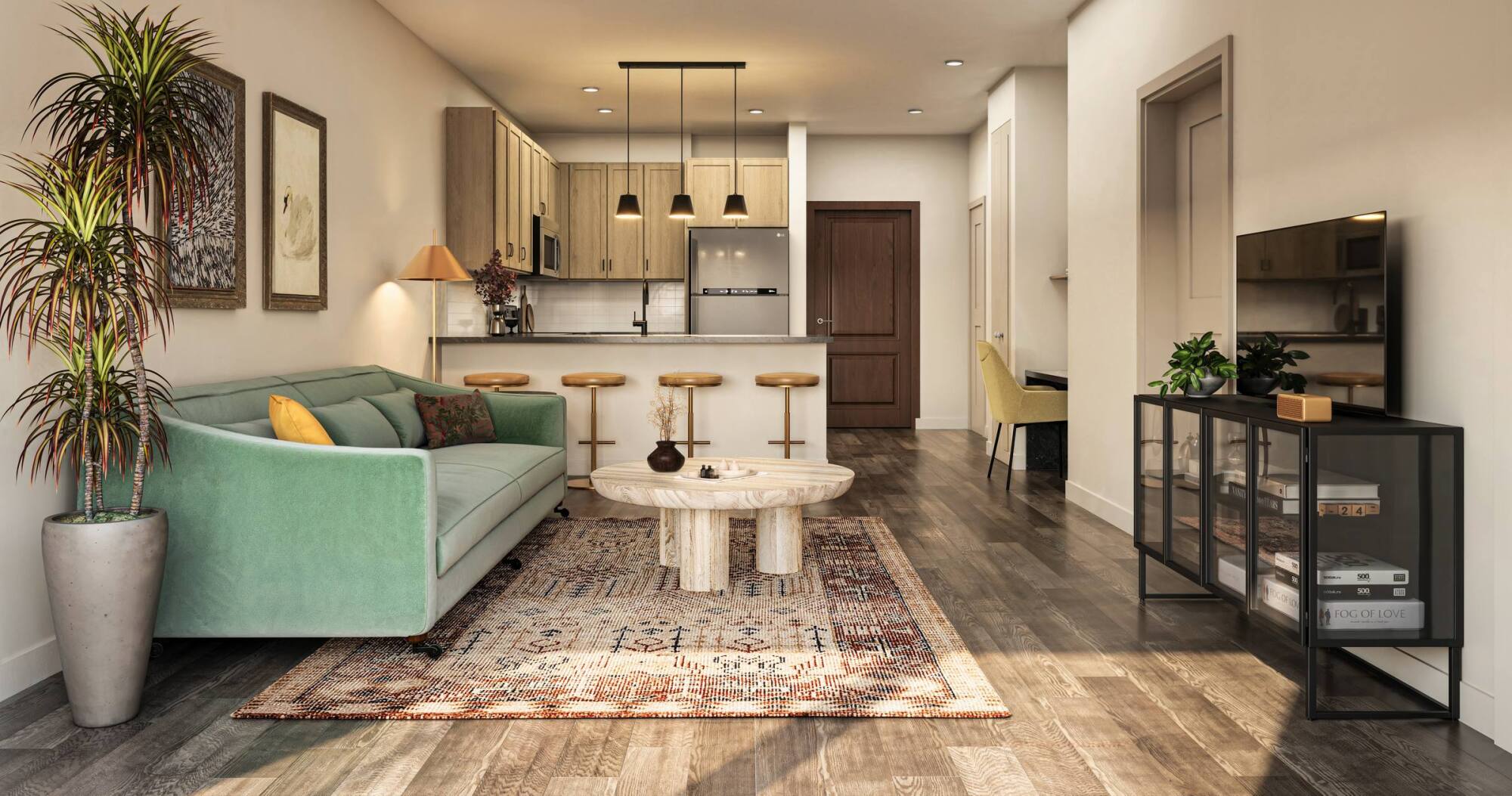Modern living room with green sofa, round coffee table, rug, TV, and open kitchen with bar stools in background.