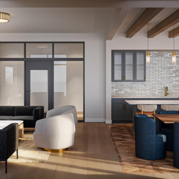 Modern open-concept living and dining area with neutral tones, sleek furniture, and wood accents.