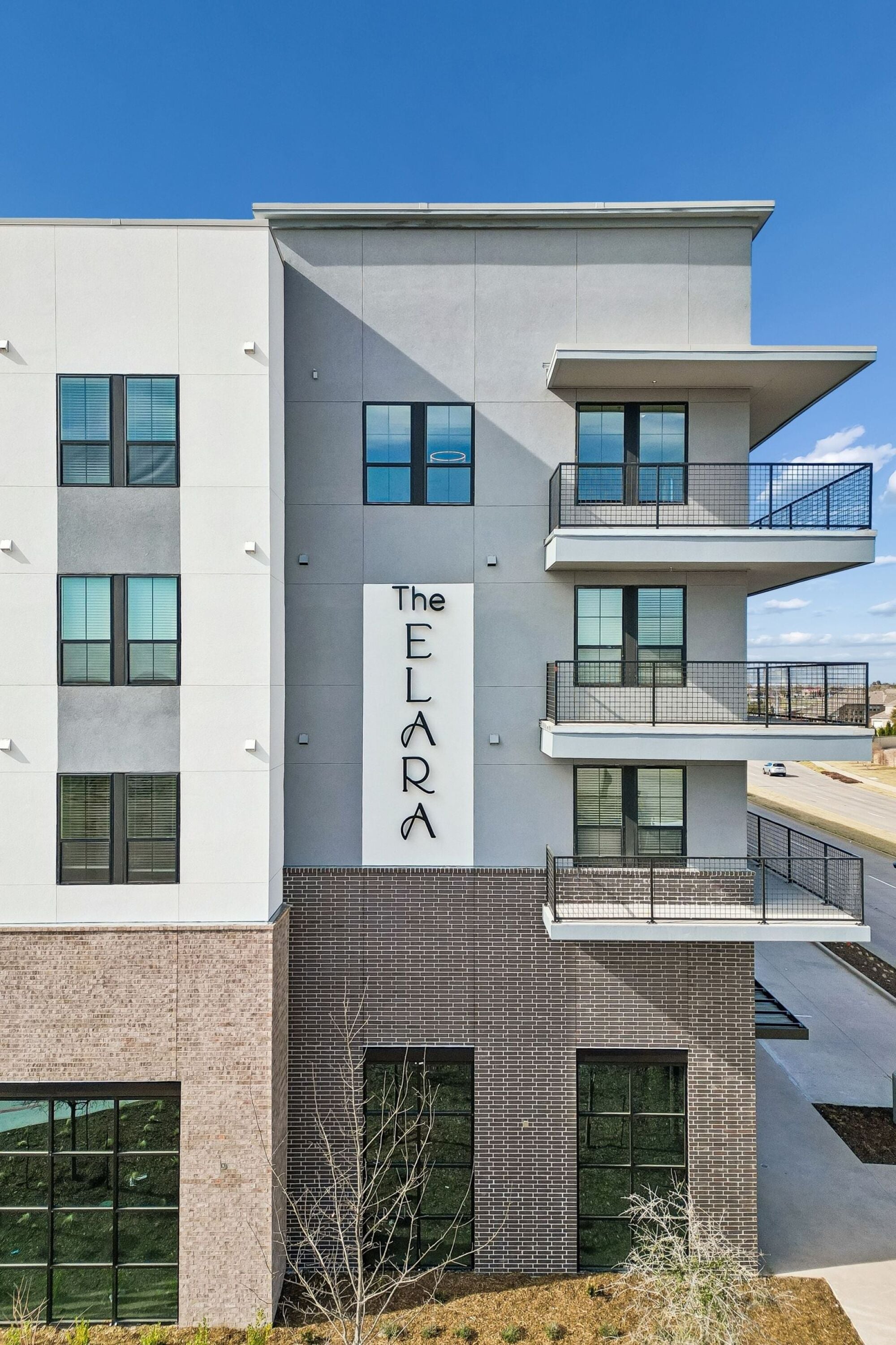 Beautiful apartment exterior near Dallas, TX at The Elara Apartments