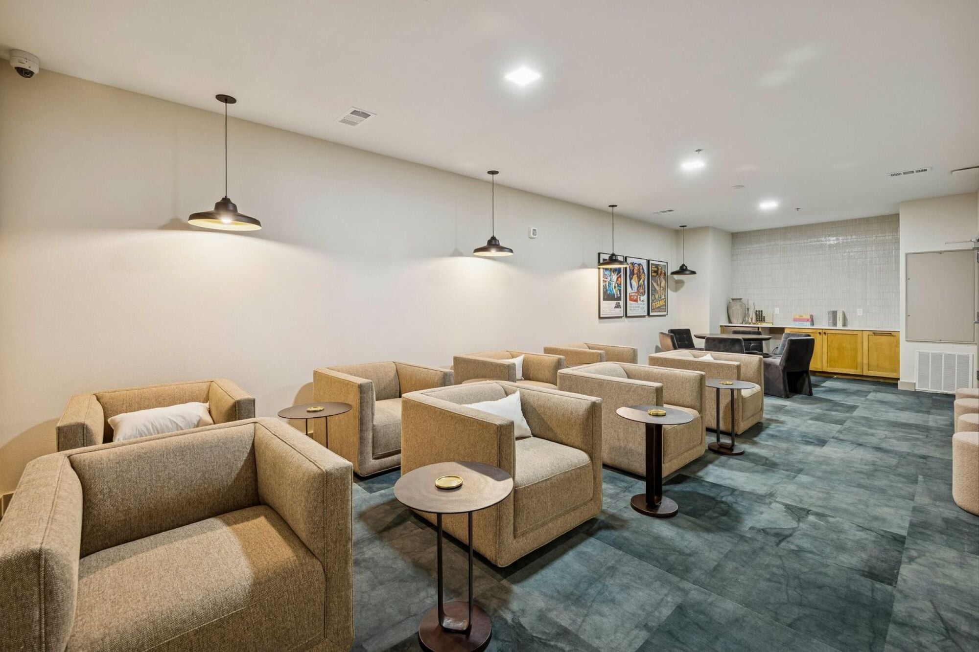 Resident movie theater room at The Elara Apartments in Farmers Branch, TX featuring comfortable seating and private screening entertainment near Dallas, TX