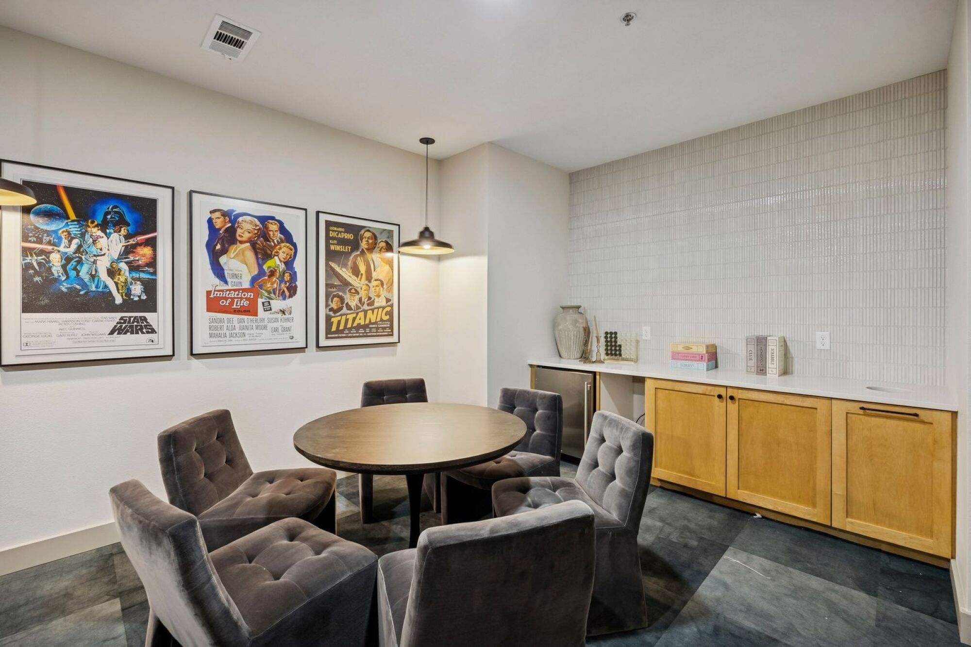 Modern game room at The Elara in Farmers Branch, TX with recreational amenities and resident gathering space near Dallas