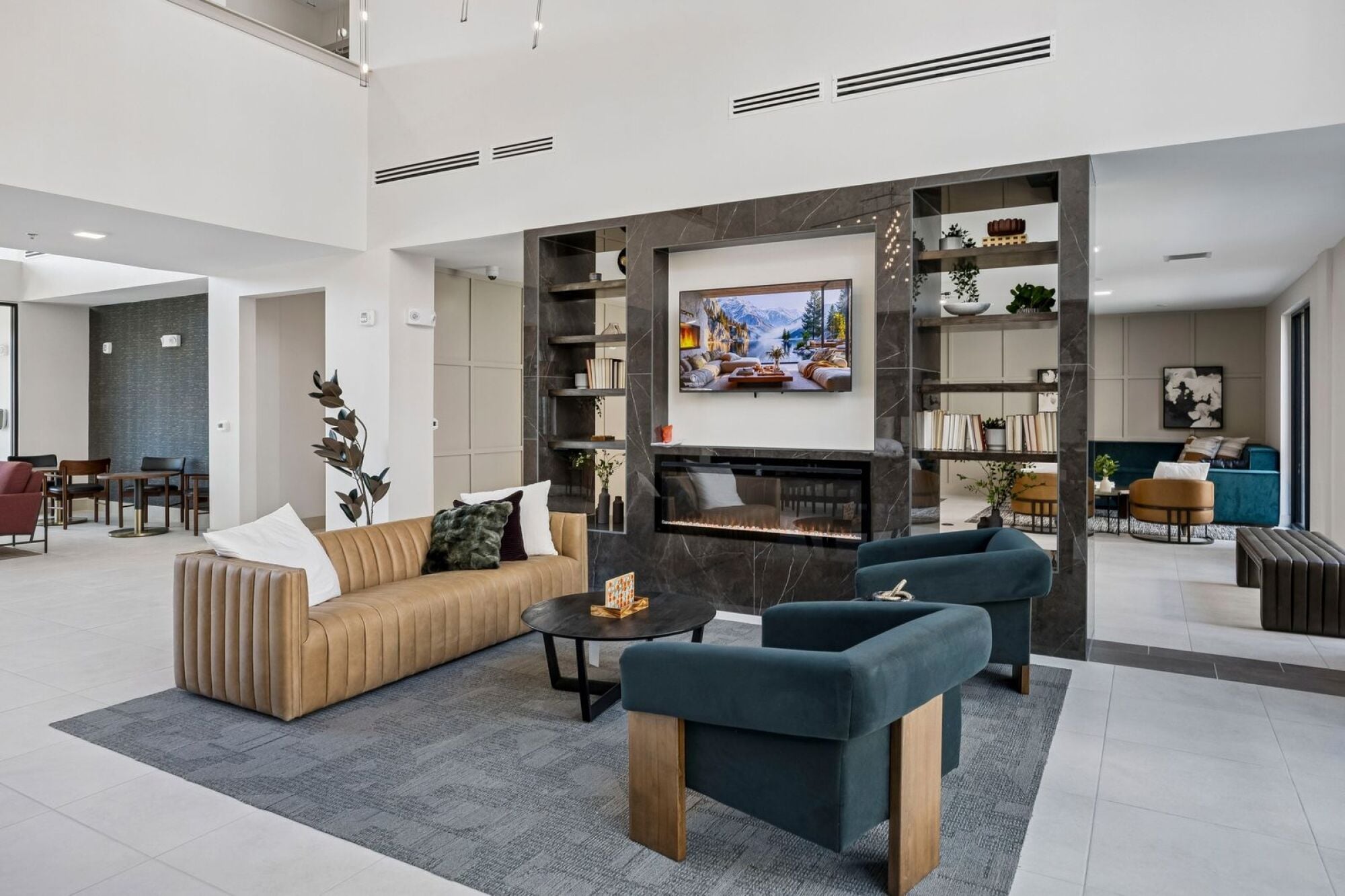 Luxury residential lobby at The Elara Apartments near Dallas, TX showcasing modern interior design and inviting common area in Farmers Branch, TX