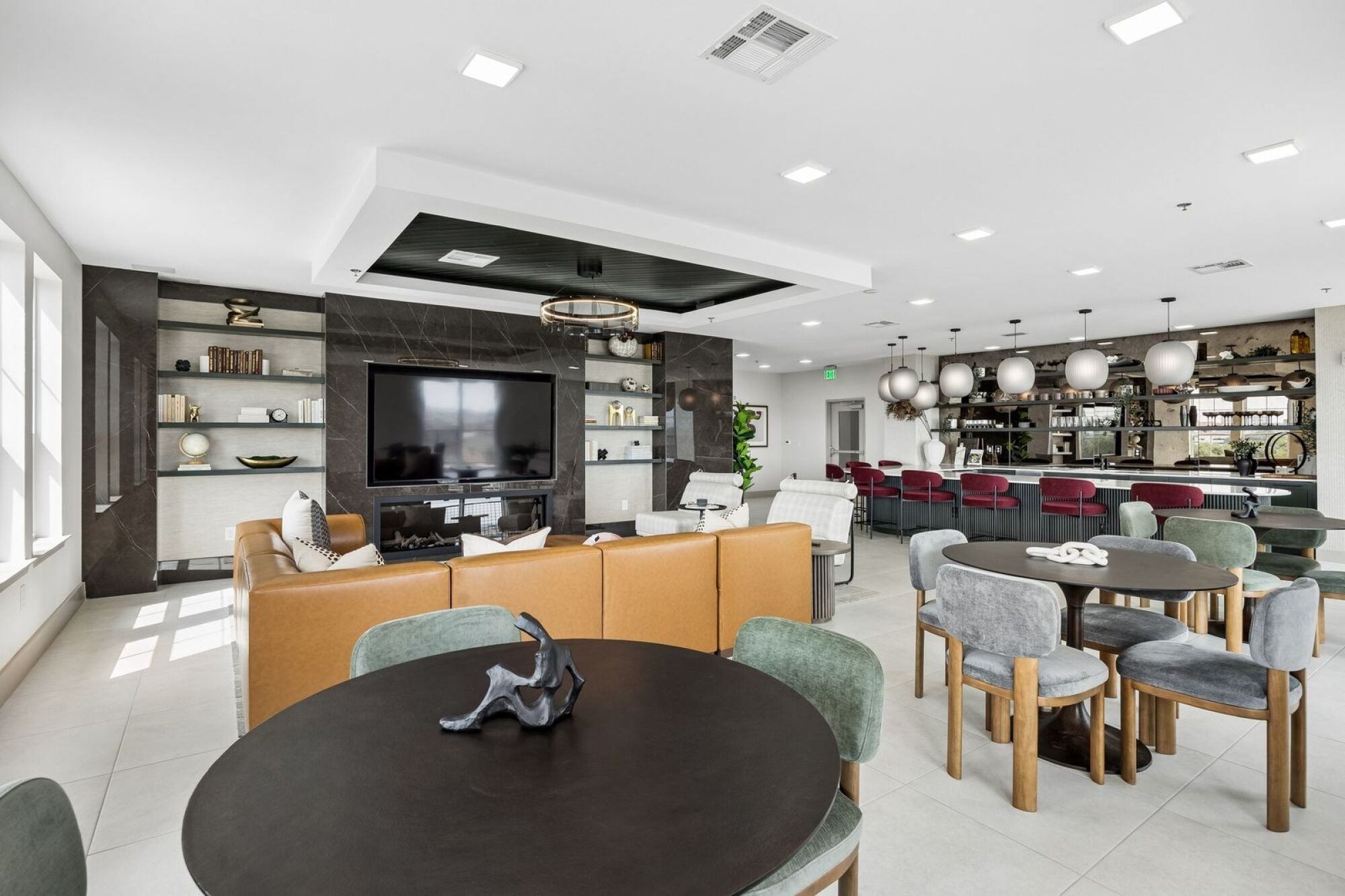 Contemporary sky lounge at The Elara in Farmers Branch, TX with comfortable seating and premium resident gathering areas near Dallas