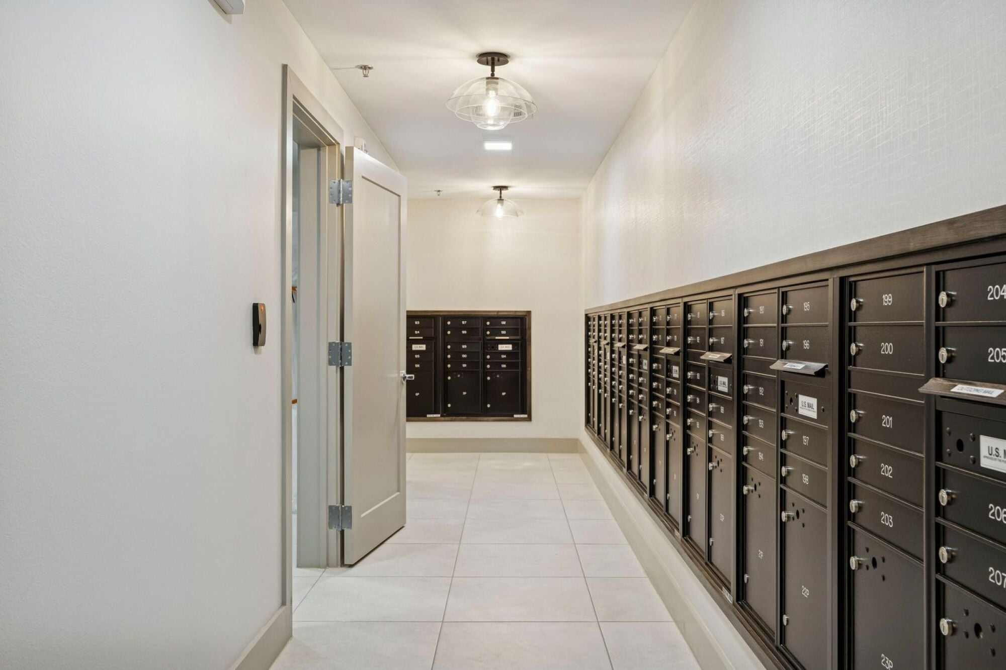 Resident mailboxes at The Elara Apartments in Farmers Branch, TX offering secure and convenient mail access near Dallas, TX