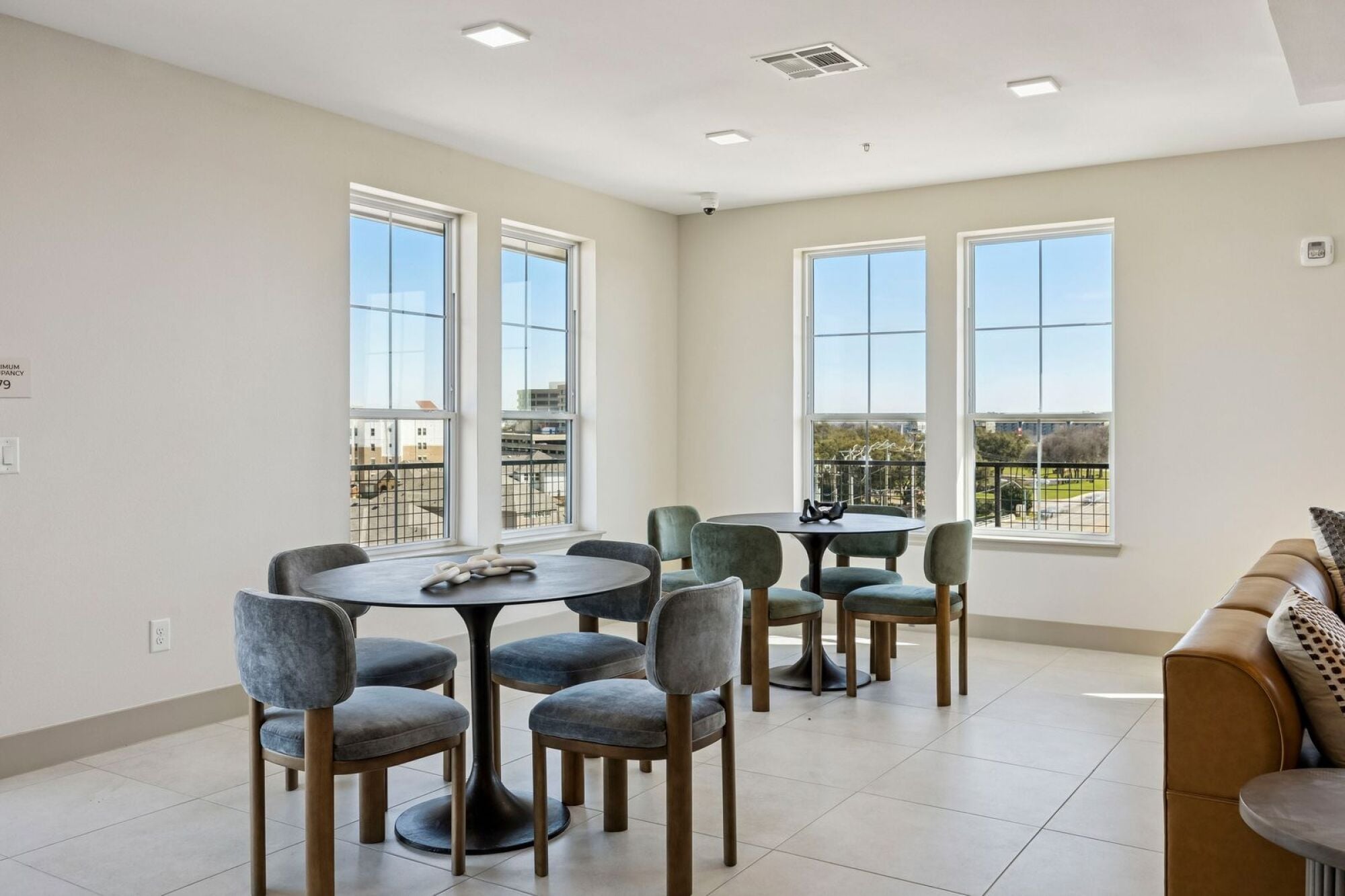 Sky lounge amenity at The Elara in Farmers Branch, TX with comfortable seating areas and expansive views near Dallas, TX