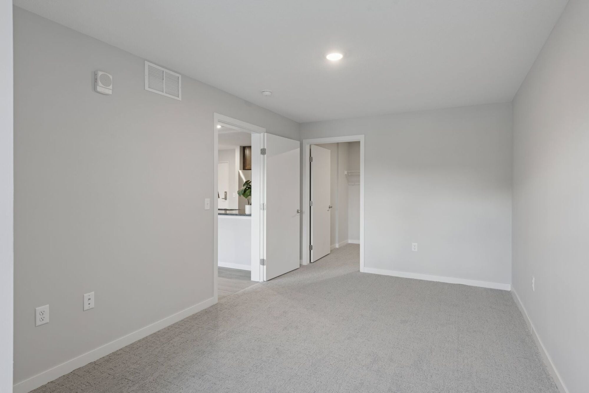 A bedroom at Callisto Commons in Fridley, MN.