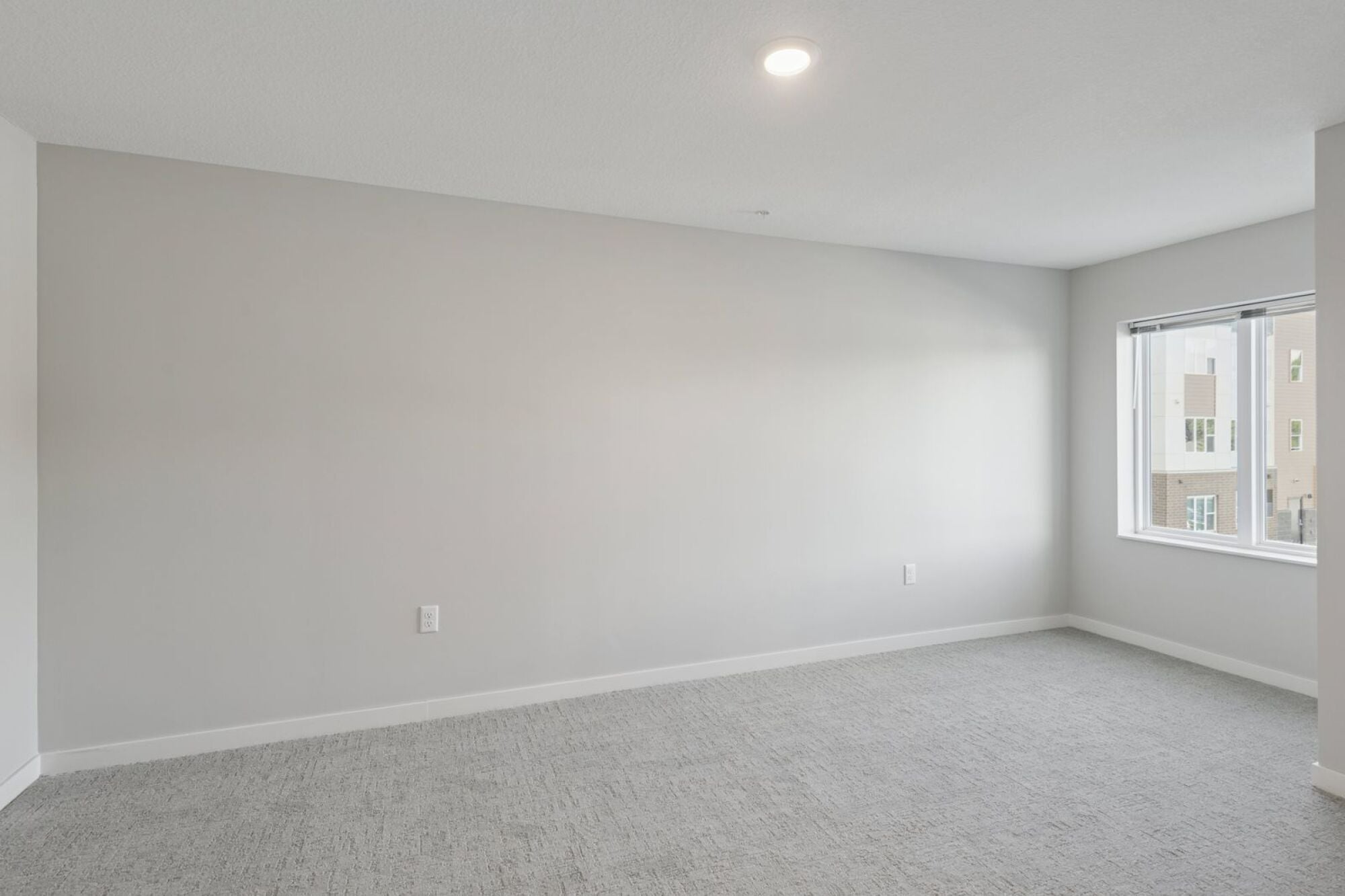 A bedroom at Callisto Commons in Fridley, MN.