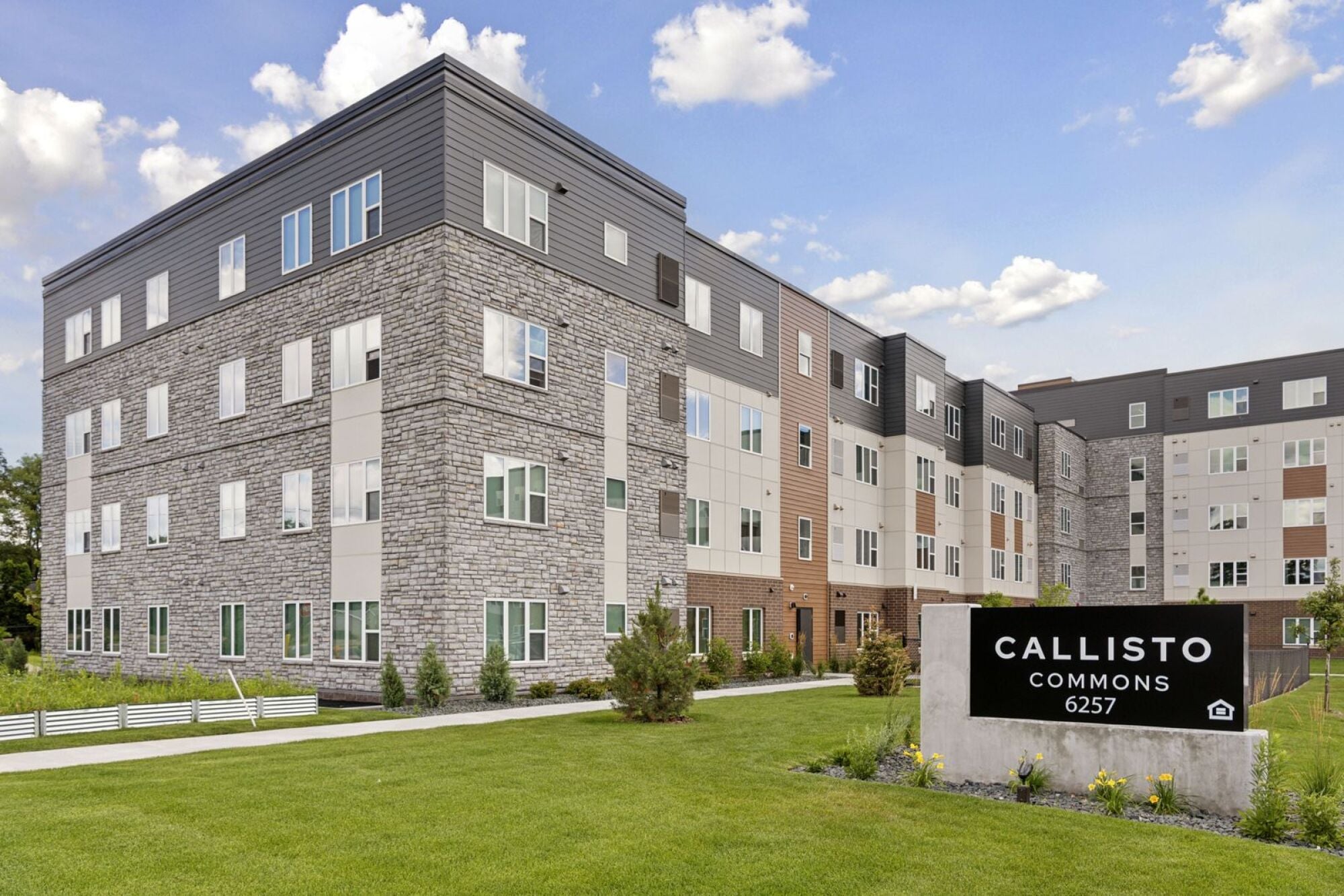 The building exterior at Callisto Commons in Fridley, MN.
