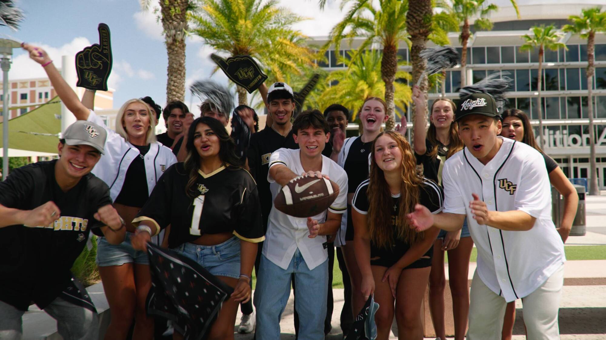 Sterling Quadrangle residents posed with football and UCF memorabilia