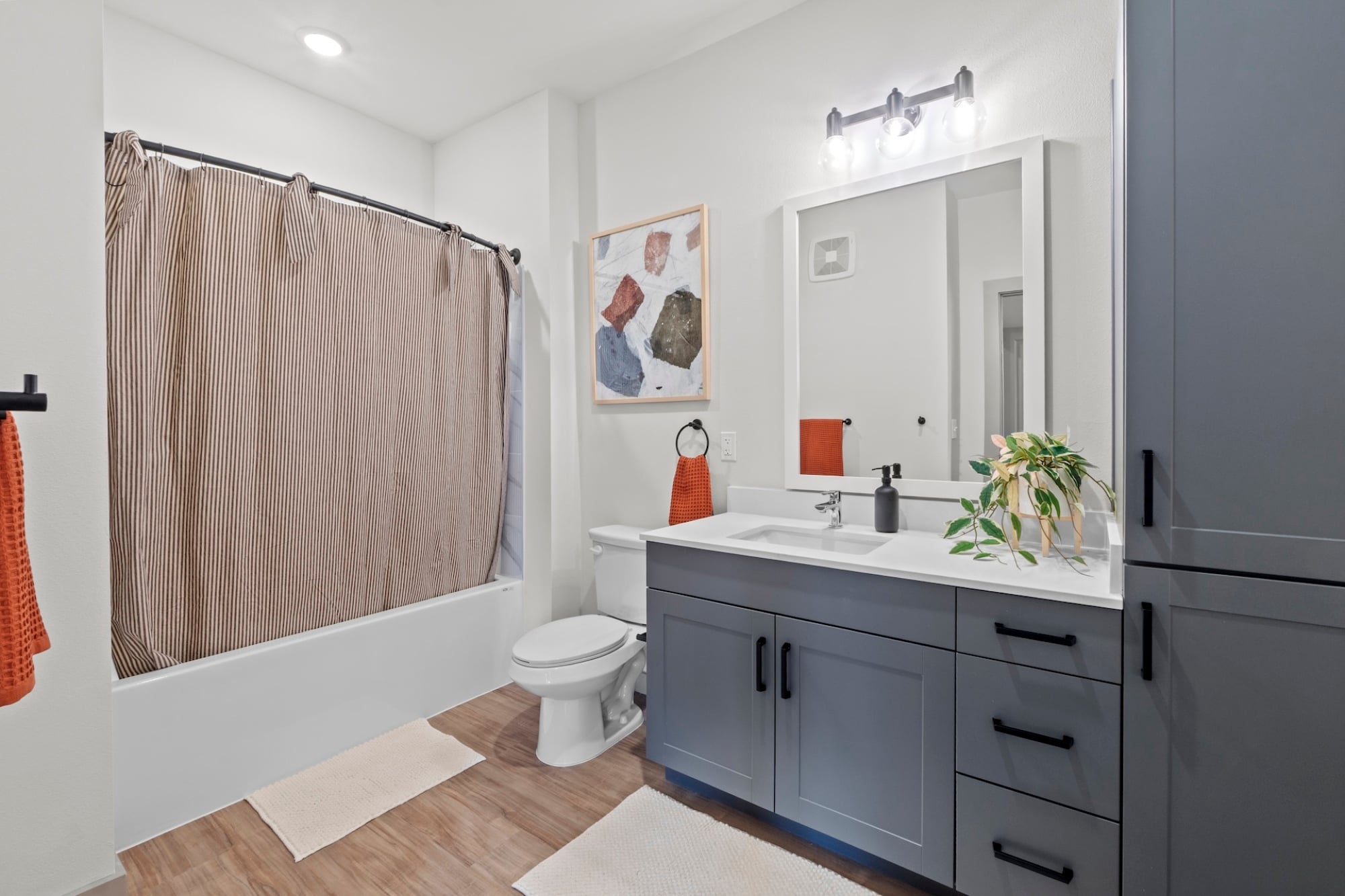 Modern Apartment Home with Bathroom featuring built-in cabinets in Austin TX