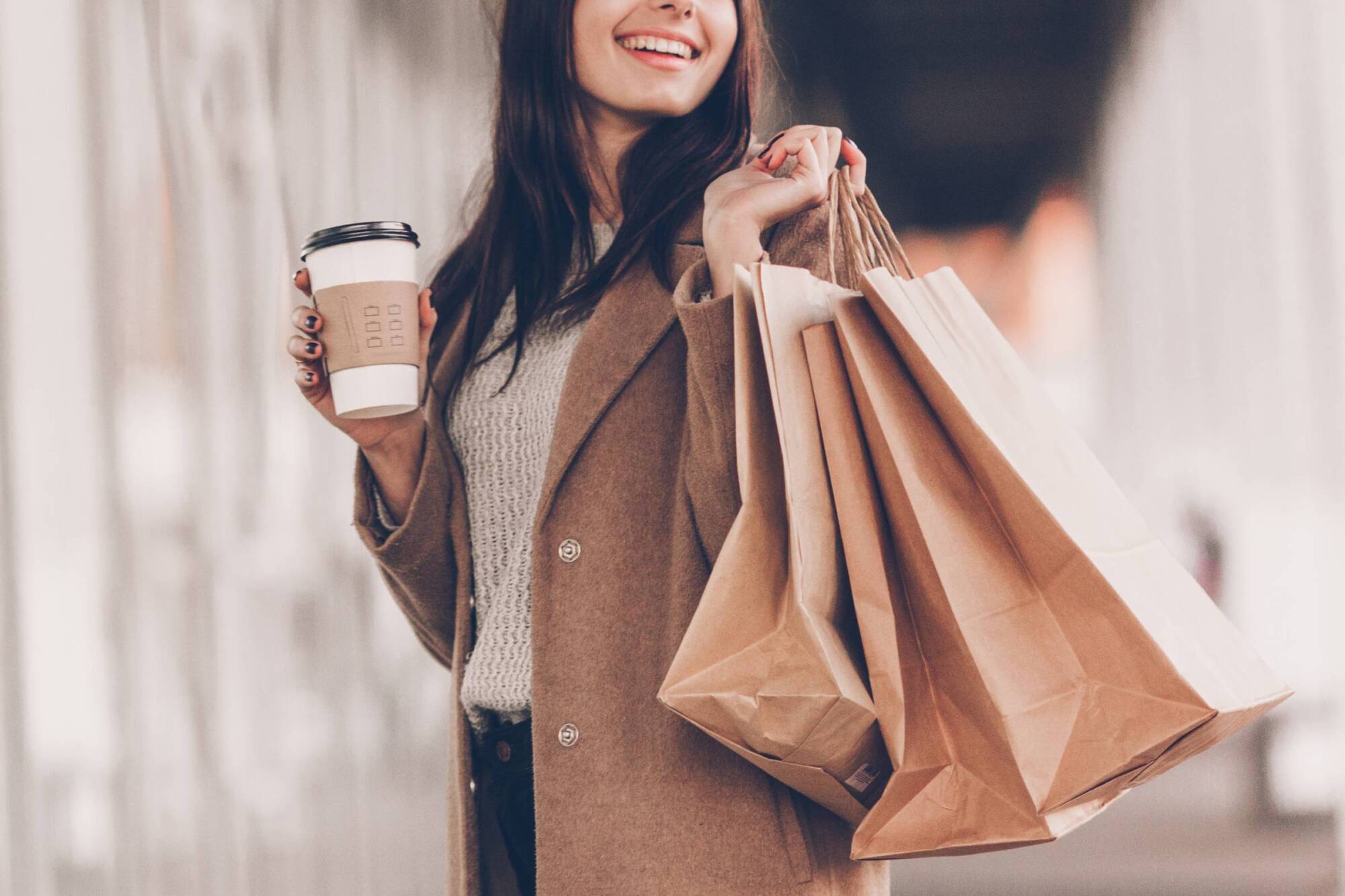 Resident enjoying shopping and coffee near Allers Landing apartments in Austin