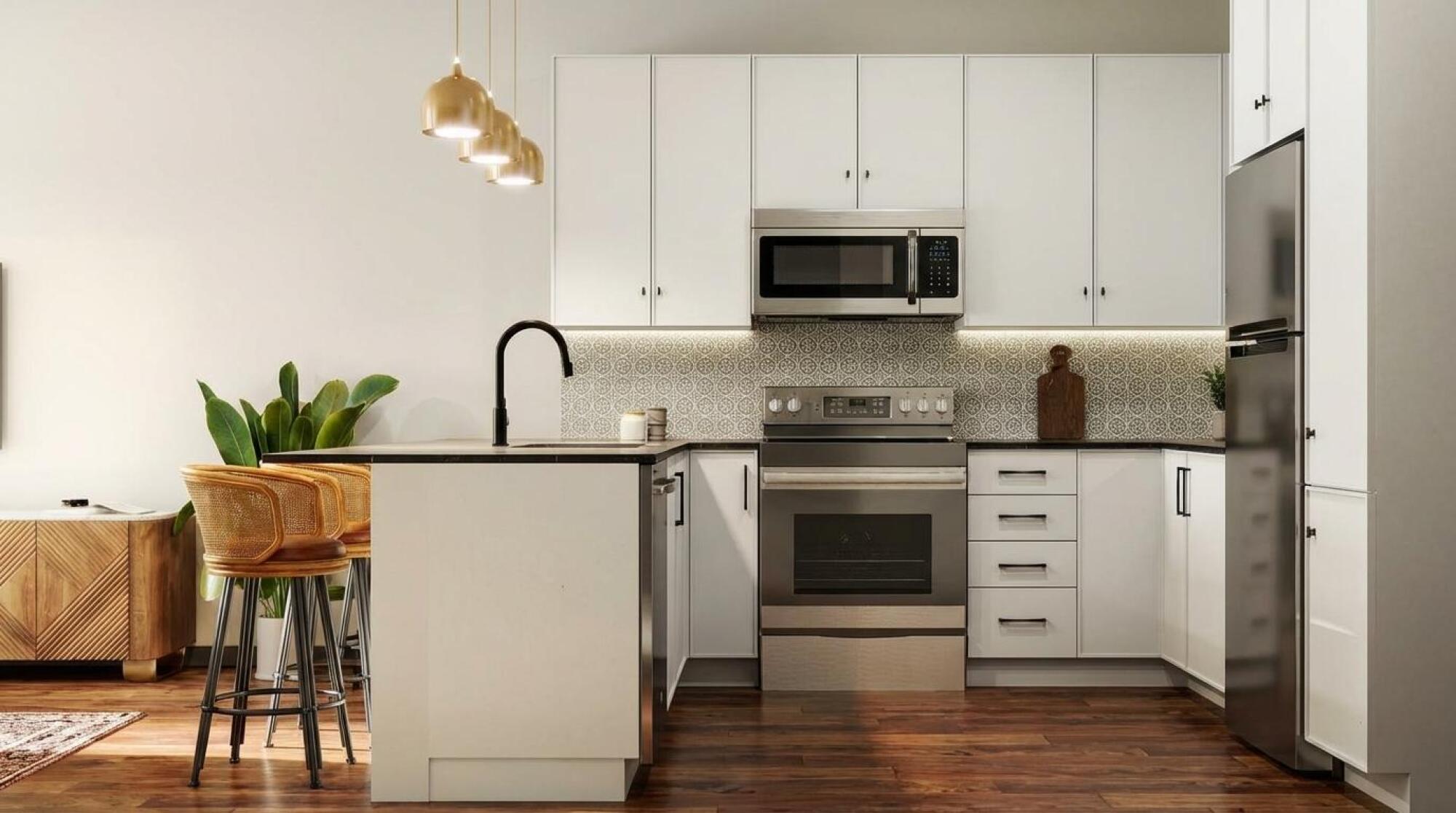 Open-concept luxury apartment kitchen and living room in Naples, FL