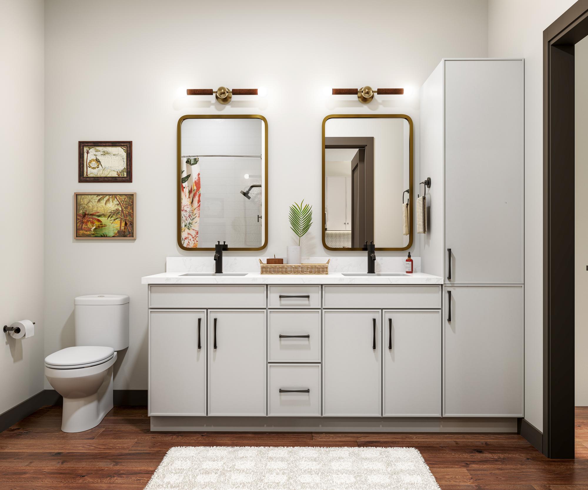 Luxury apartment bathroom with double vanity at The Karlyn active adult community in Naples, FL