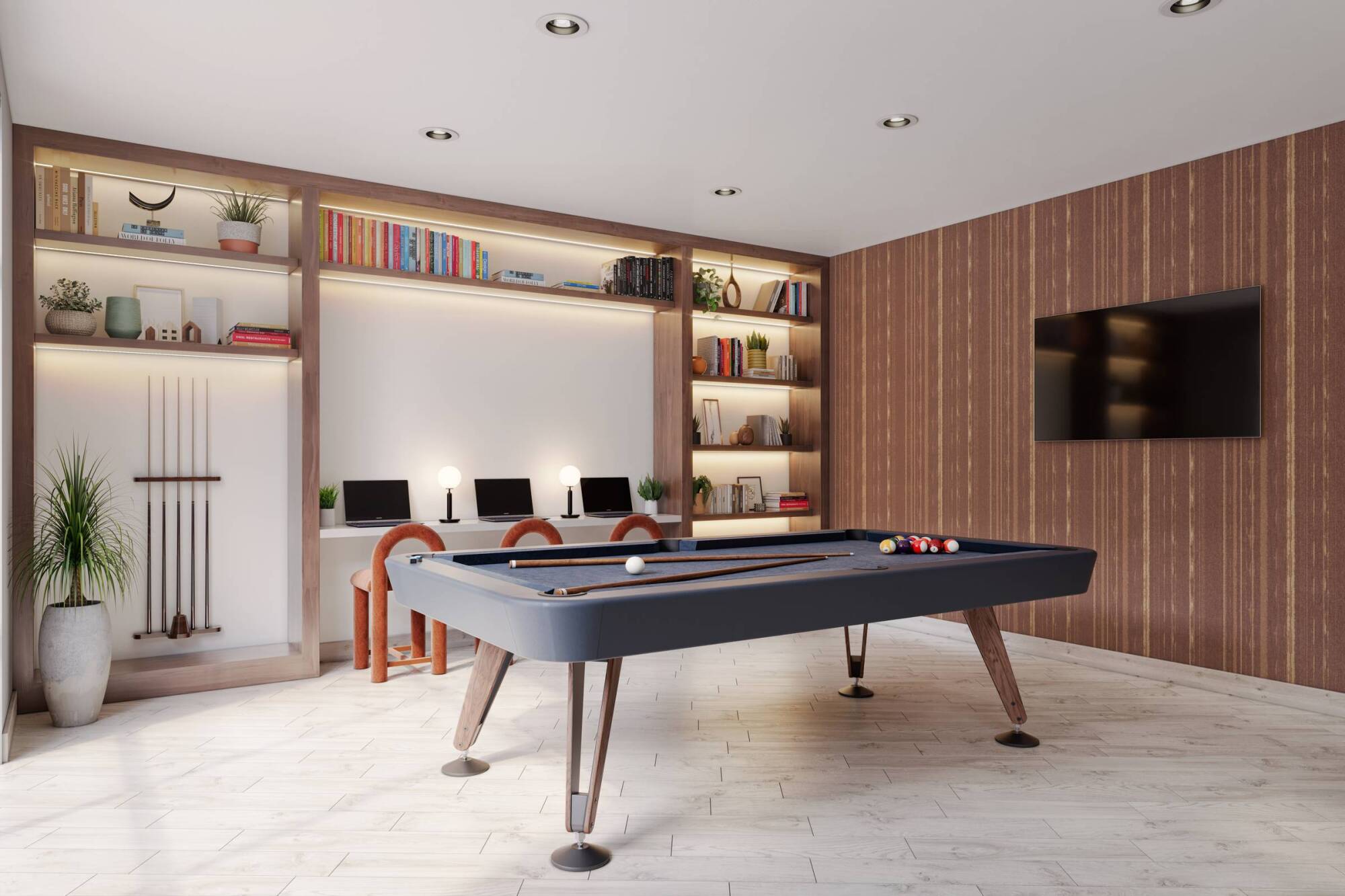 Wixby House Modern game room with a pool table, wall-mounted TV, bookshelves, desk, and plants.