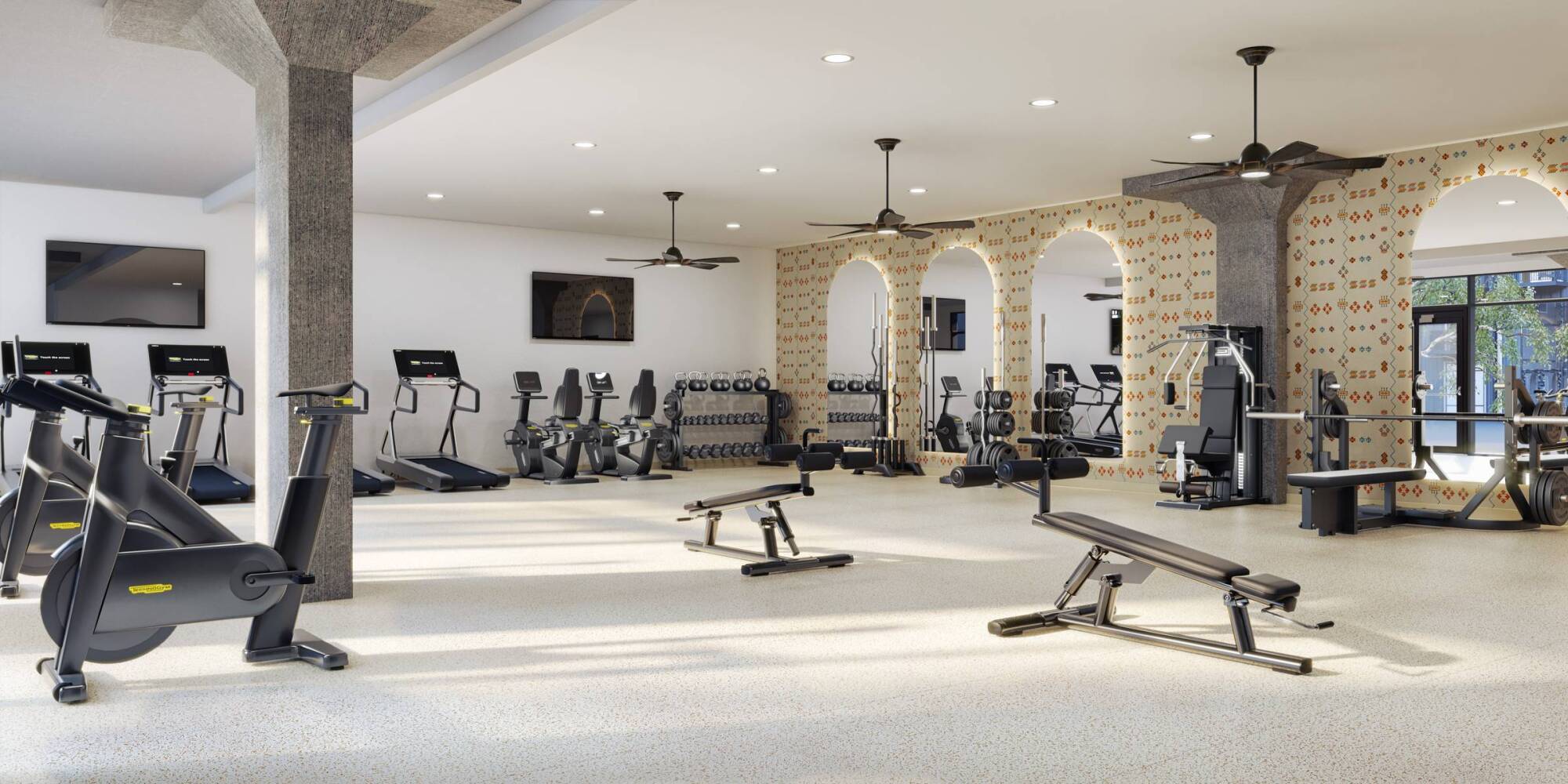 Modern fitness center with cardio equipment at Wixby House apartments in Austin, TX