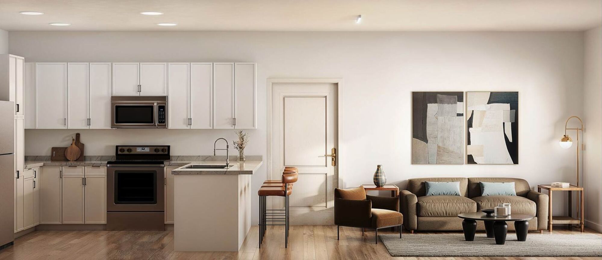 Bright kitchen and living area at Linden Village featuring modern cabinetry, stone countertops, and warm wood-style flooring.