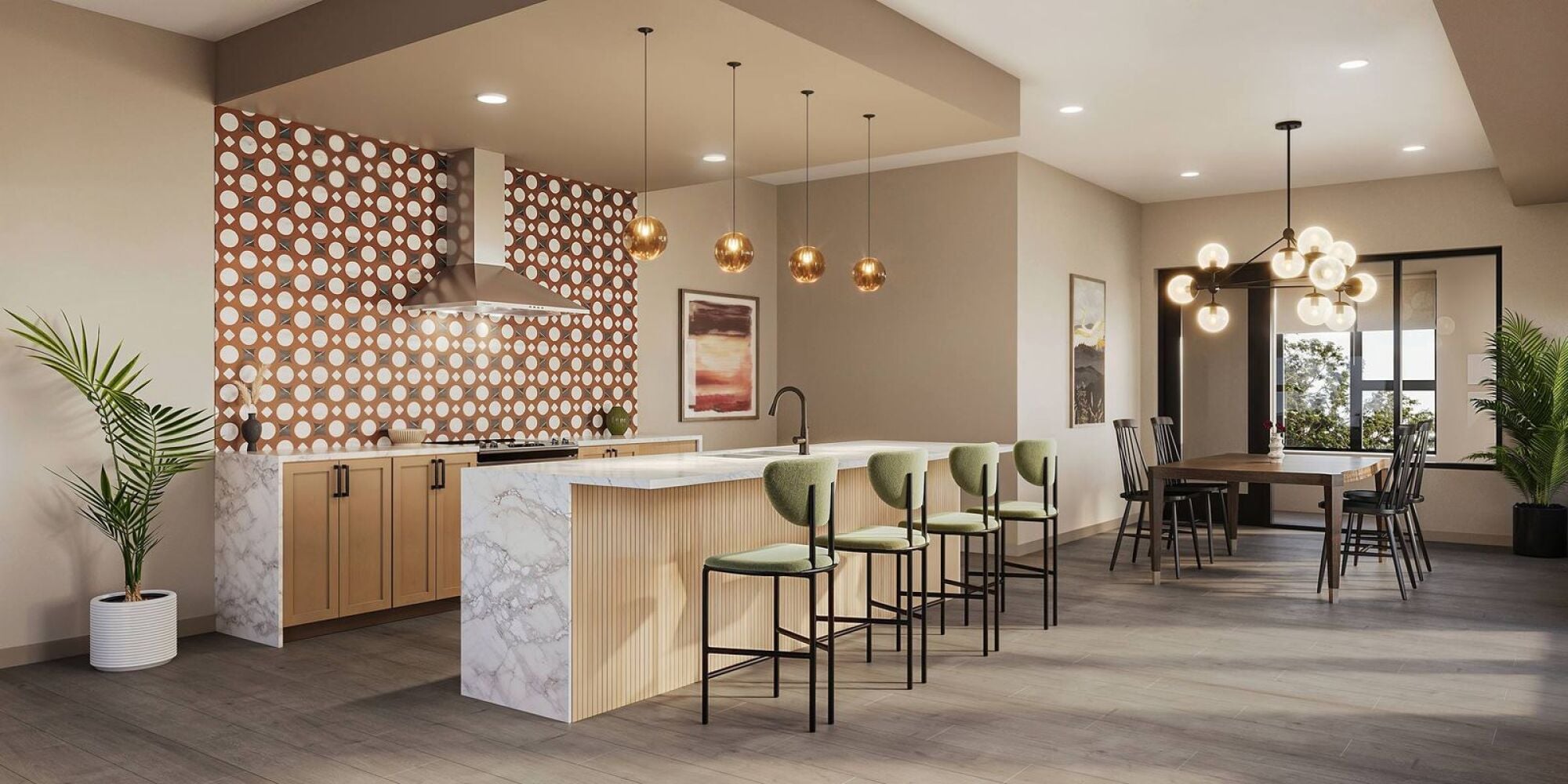 Modern kitchen with marble island, green barstools, gold pendant lights, and patterned tile backsplash at Harlow.