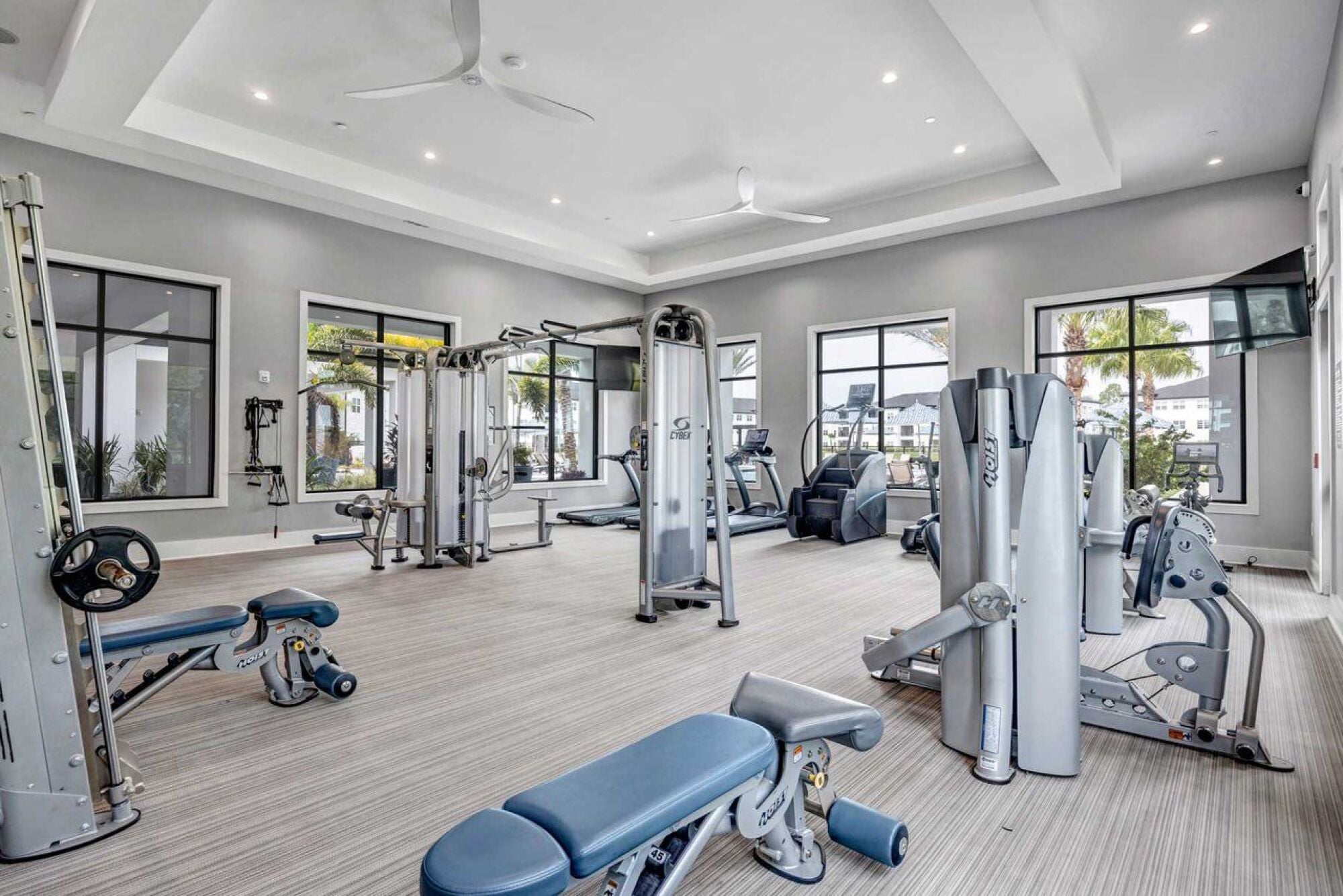 gym featuring ceiling fan