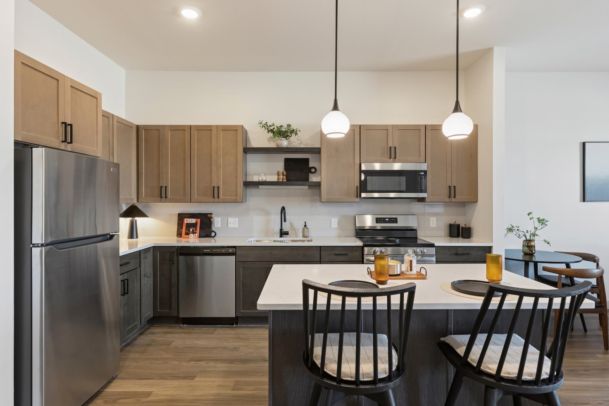 Modern Apartment Kitchen with Stainless Steel Appliances at Belterra Apartments in Plymouth MN