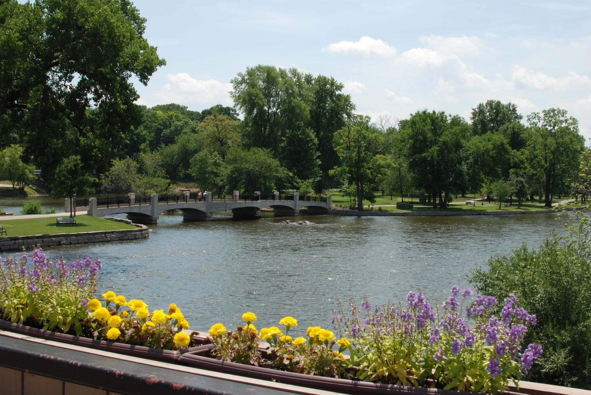 Footbridge over the Fox River at Island Park near Ashford at Geneva apartments in Geneva, IL
