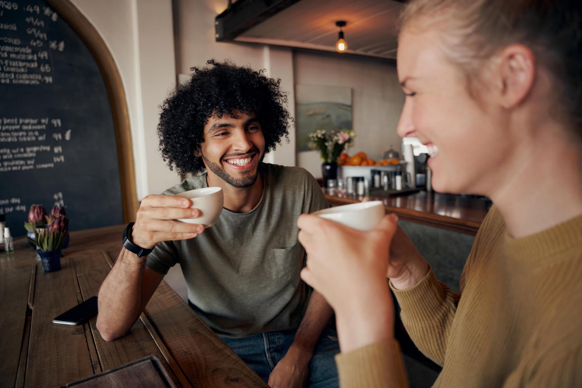 Conversation over coffee at a local shop near Merit 38 apartments in south Fargo, ND