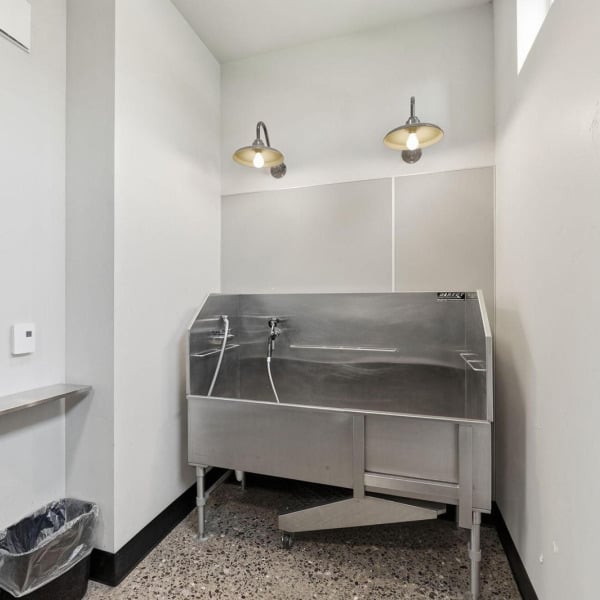 Stainless steel pet wash station for residents at Cypress apartments in Redmond, Oregon.