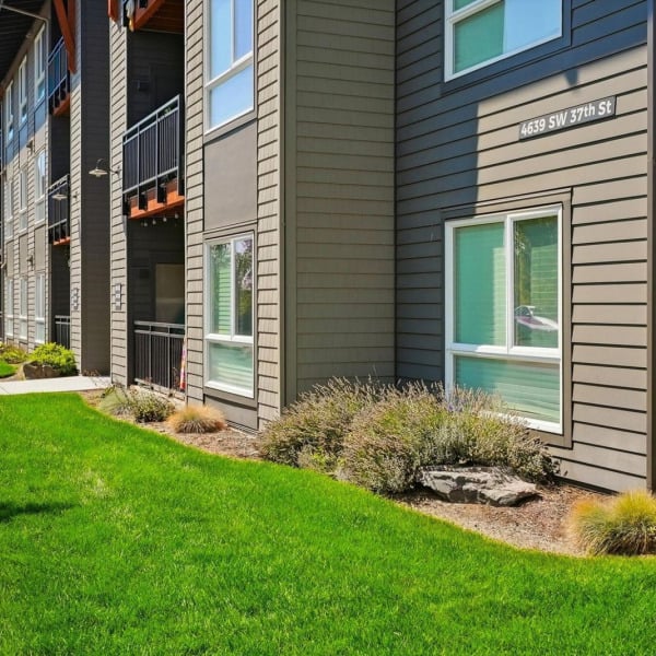Cypress in Redmond, Oregon, with a marked building entrance framed by lavender and drought-tolerant high desert landscaping.