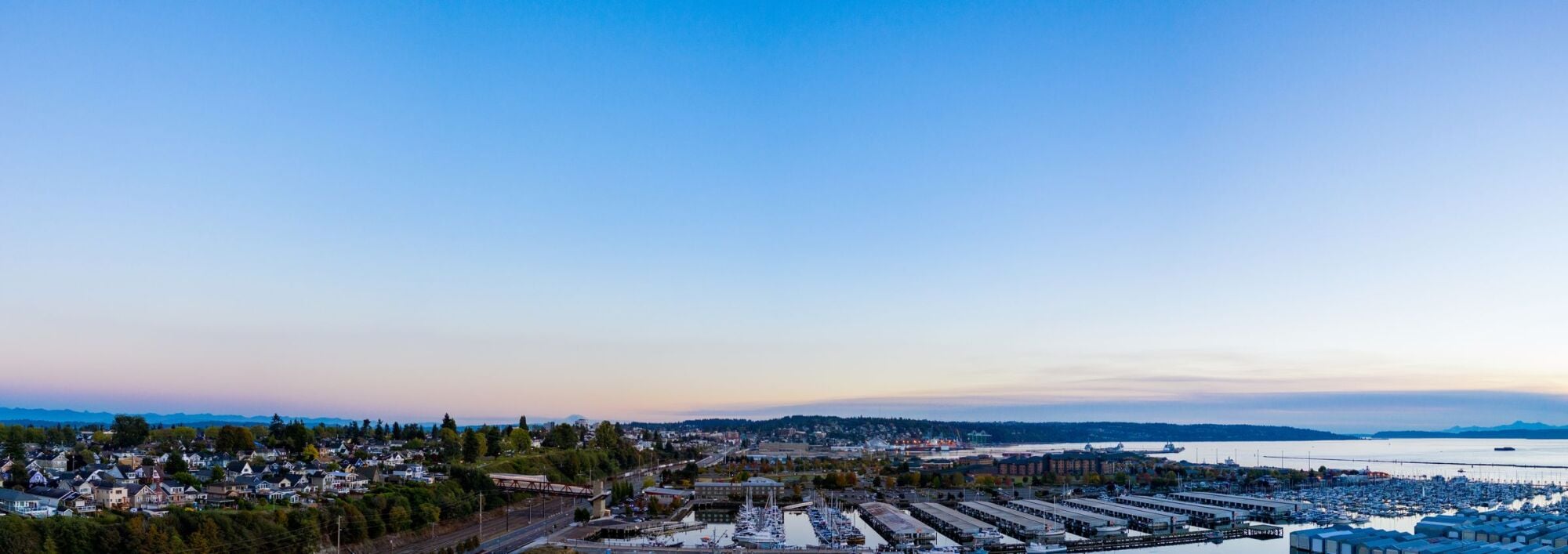 Panoramic view of the Everett marina and waterfront at dusk near Waterfront Place in Everett, WA
